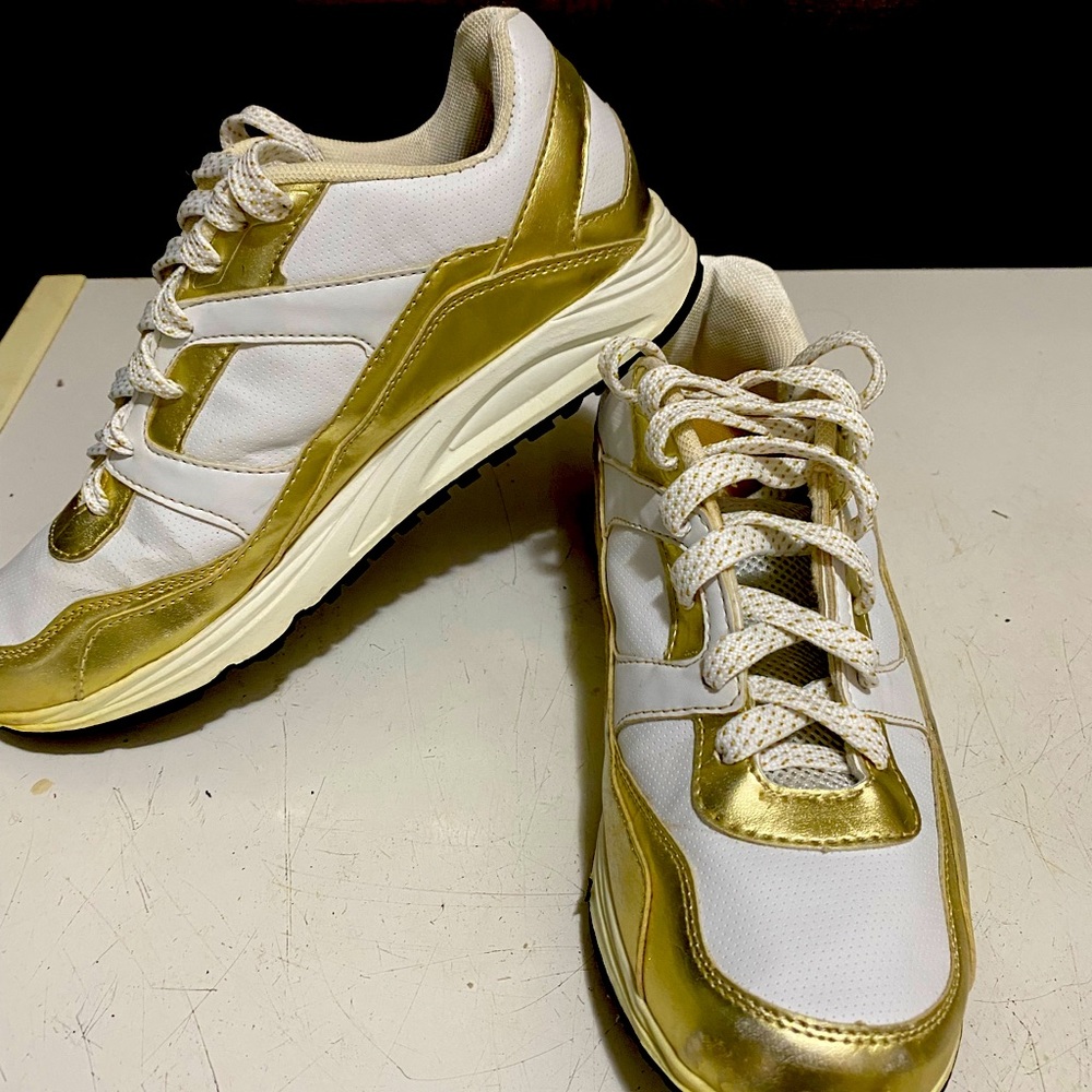 Air Sports World gold and black sneakers size 9